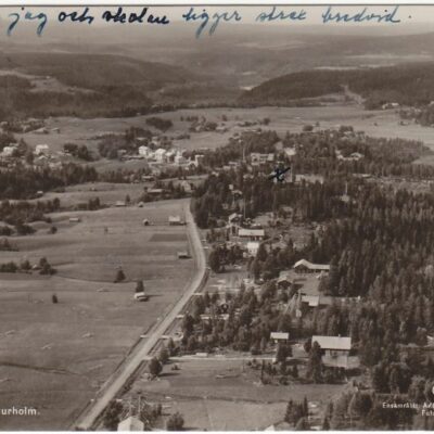 Flygfoto över Bjurholm Förl: Anderssons Pappershandel, Bjurholm, Tel. 9Poststämplat 3/9 1942Ägare: Åke Runnman9x14